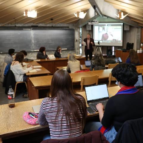Students listening to a lecture in a classroom at Champlain College