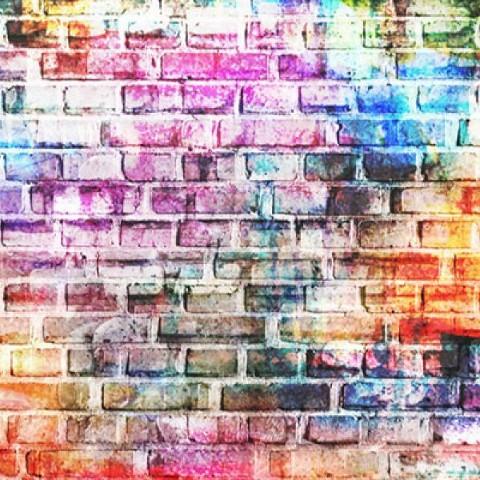 A multicoloured mural on a brick wall