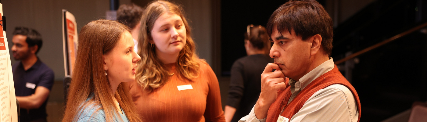 three people talking