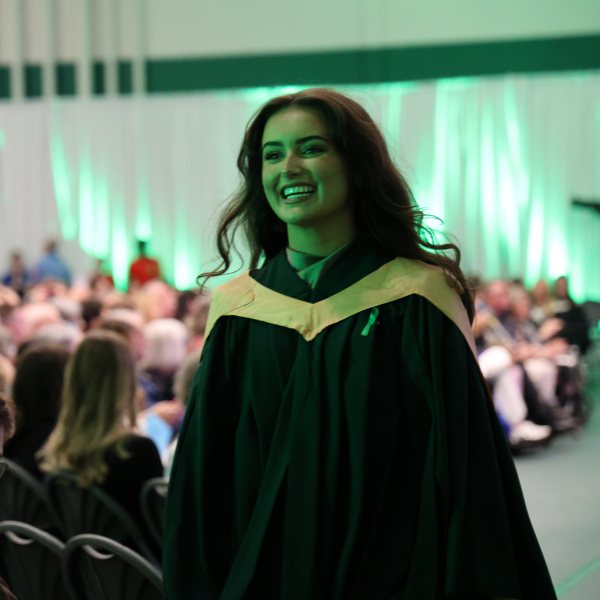 Smiling graduate at convocation