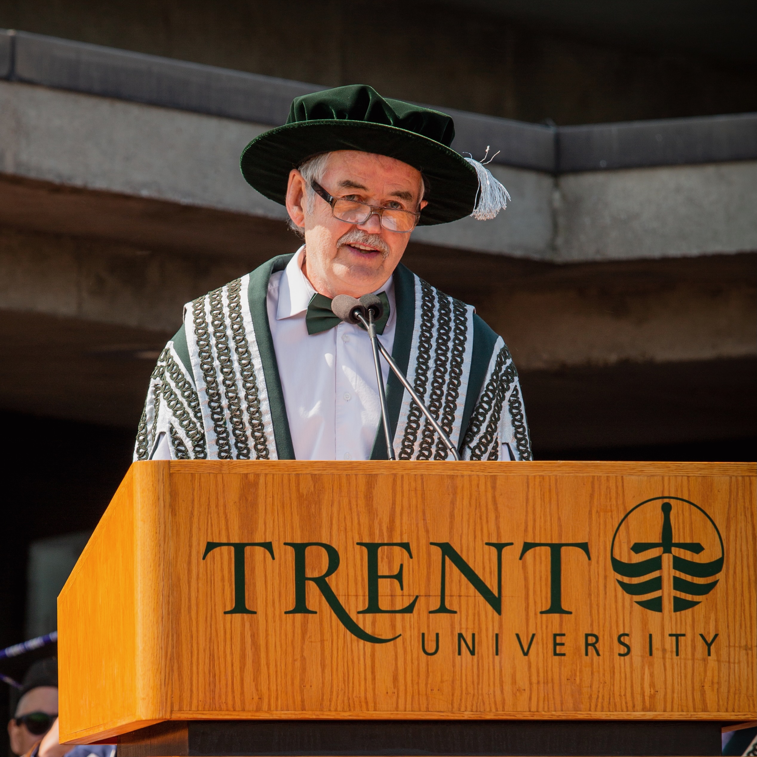 Headshot of Leo giving Convocation Address