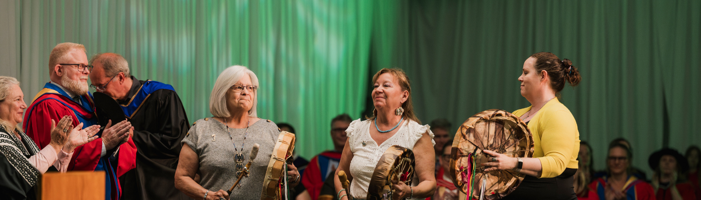 Unity performing at a convocation ceremony
