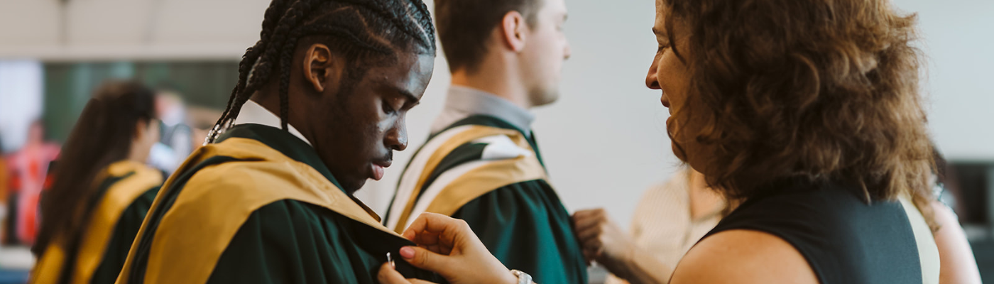 Student getting gowned