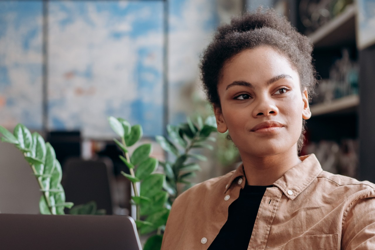 Photo of a Woman with a Brown Long Sleeve Shirt Looking Away. Free Stock Photo (pexels.com)