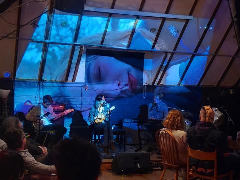 musicians on a stage 