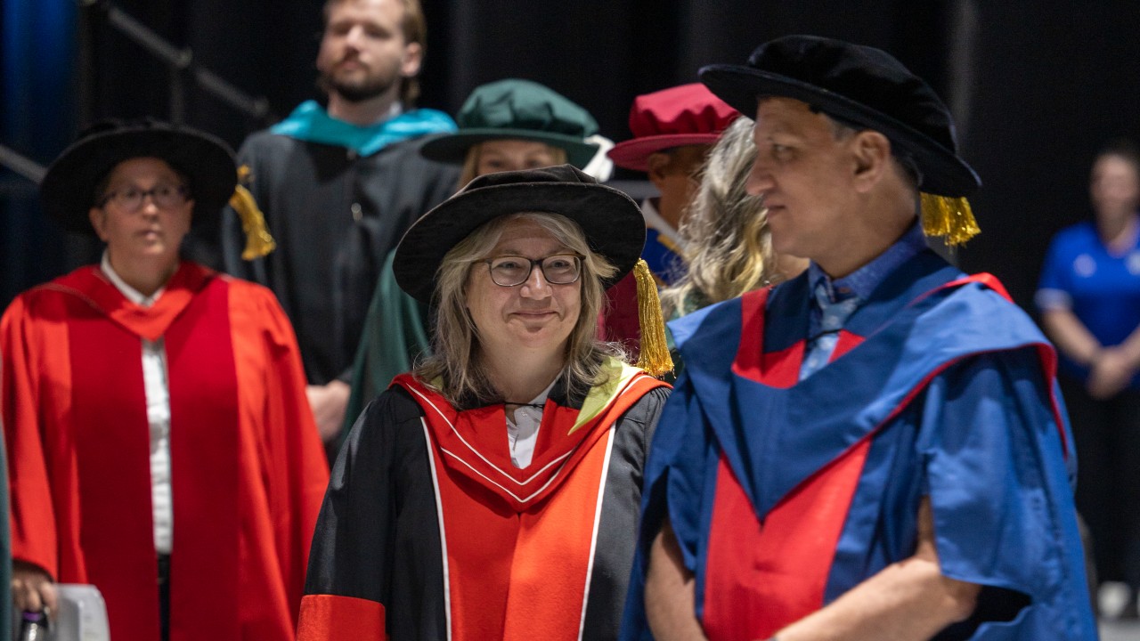 Scott Henderson & Cathy Bruce in the Convocation procession