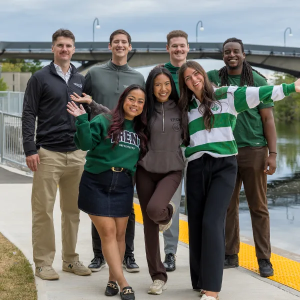 Recruiters wave at the camera
