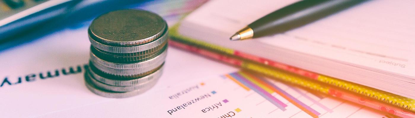 Pen on paper and change