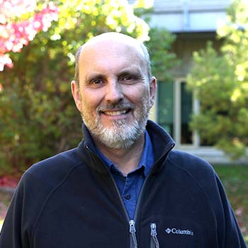 Paul Elliott smiling in the Otonabee Quad