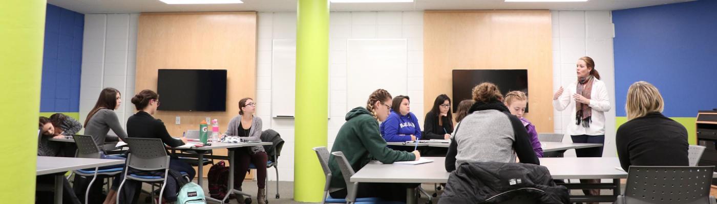 Students listening to Robyne lecture