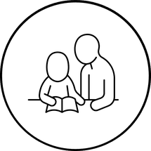 An adult helping another read