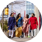 Four students walking in downtown Oshawa