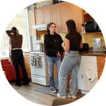 Two students talking in one of the kitchens on campus