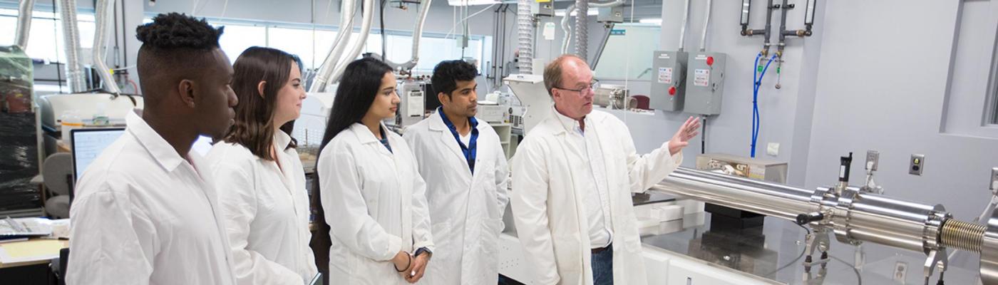Trent University students receiving instruction in a Chemistry lab