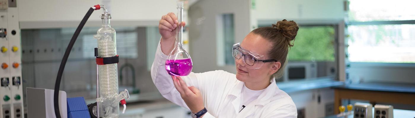 a chemistry student in a lab