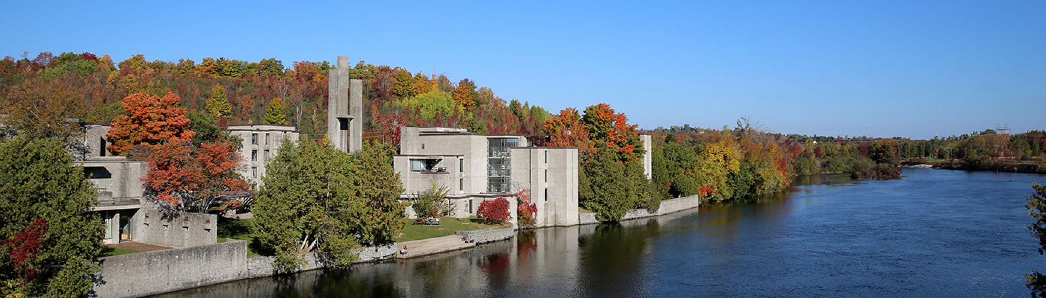 Champlain College in the fall from across the river