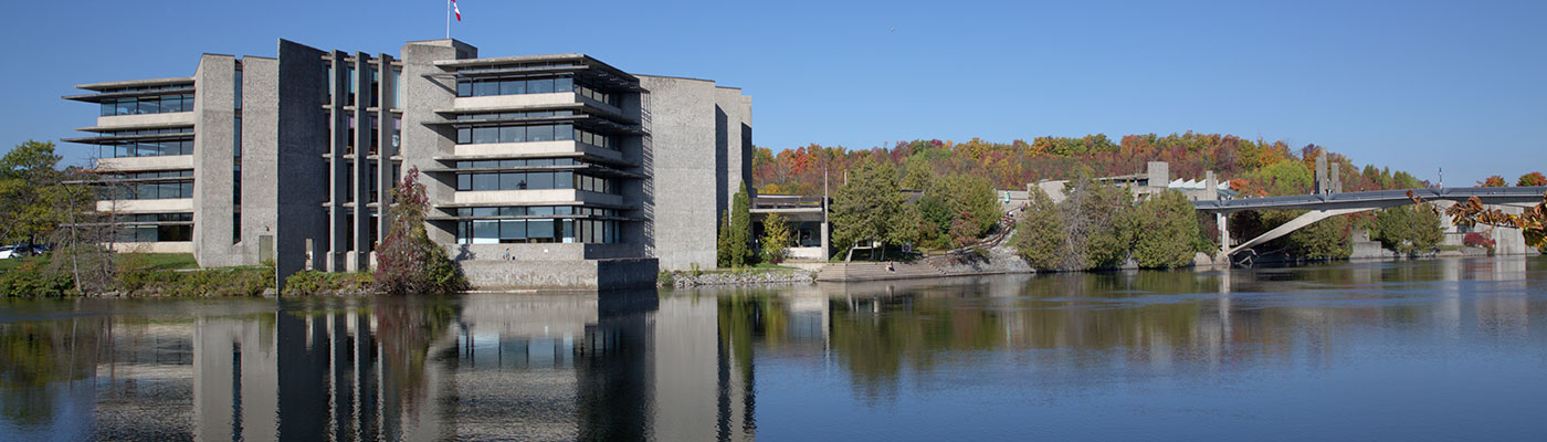 Bata library in the fall taken from across the Otonabee river.