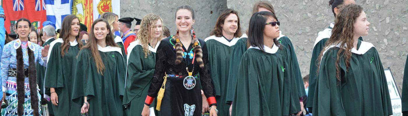 Student walking pass the Bata Podium during Convocation