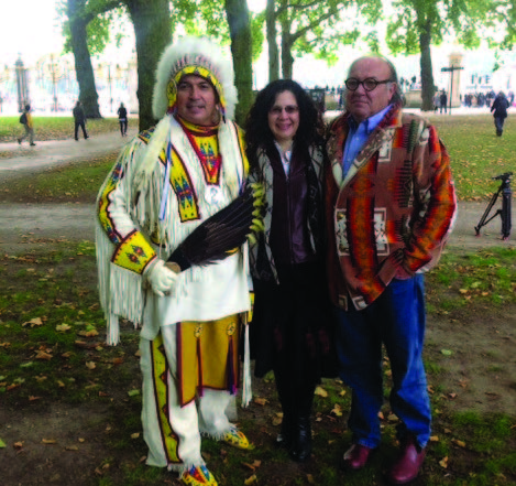 male in Indigenous Regalia, woman in black coat, John Milloy in Pendleton coat fall 2013 in London, England, 250th anniversary of the 1763 Royal Proclamation