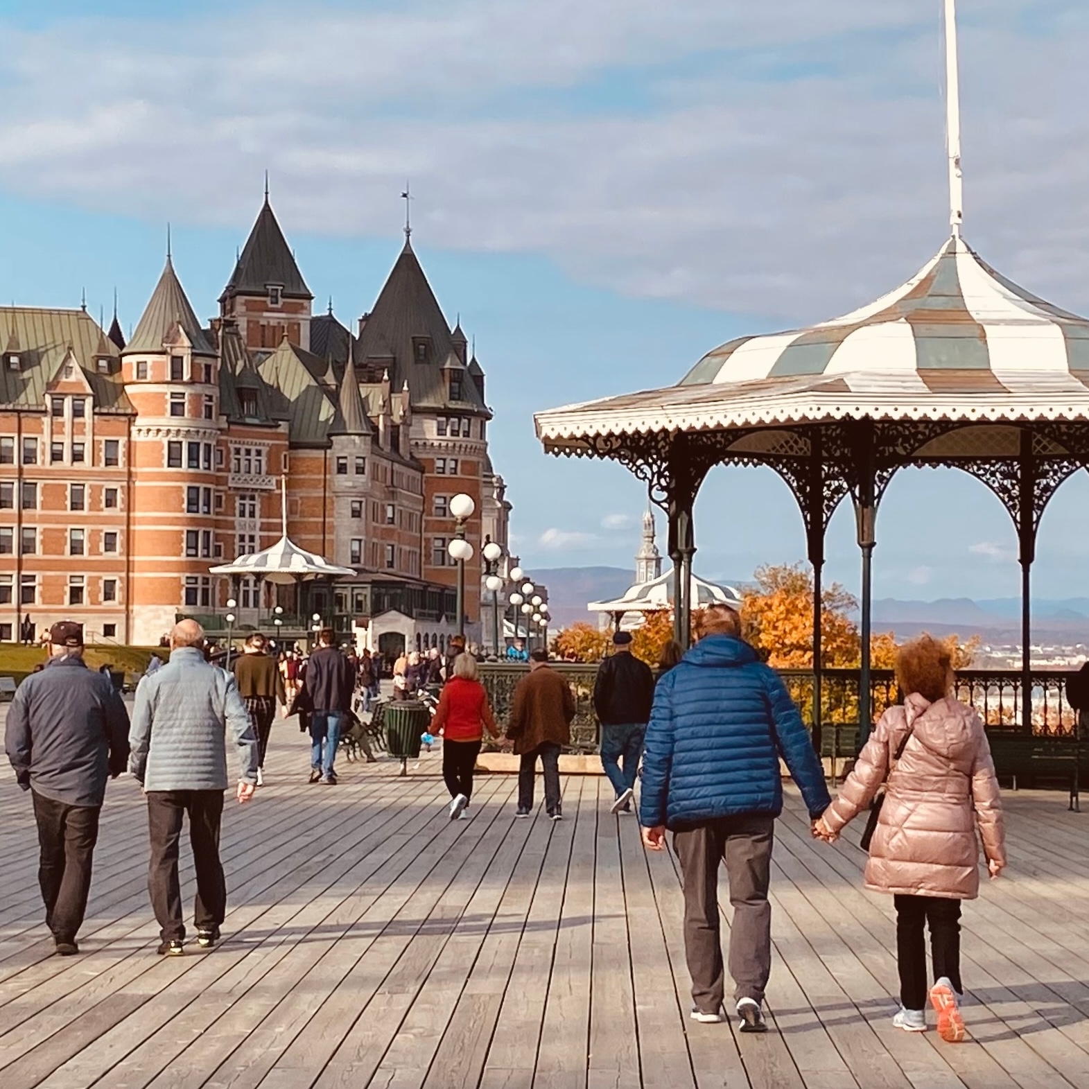 People walking on pier