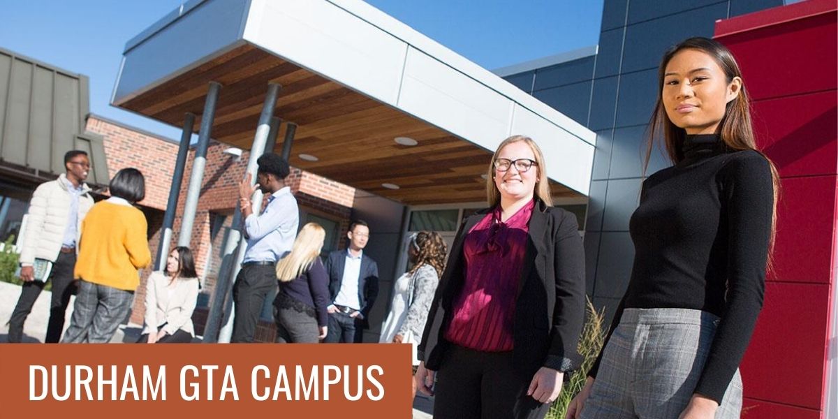 Students standing in front of Trent University Durham GTA with the words "Durham GTA Campus" highlighted.