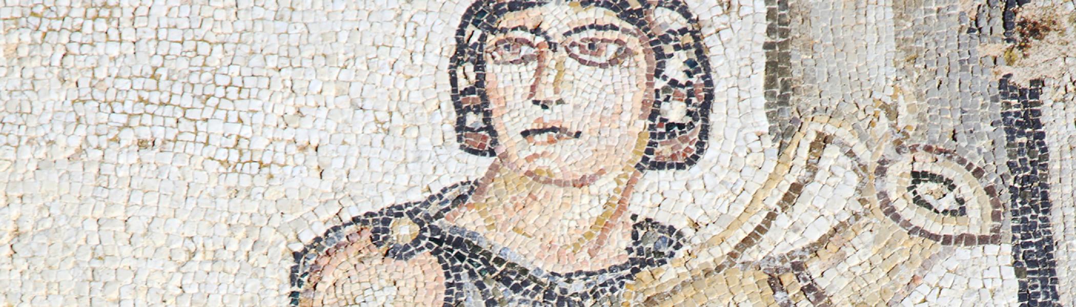 Ancient greek mosaic of person holding a vase