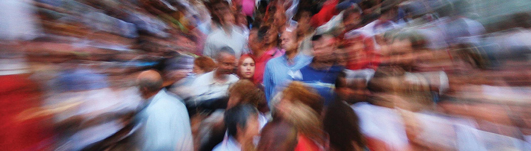 Blurred image of a crowd of people