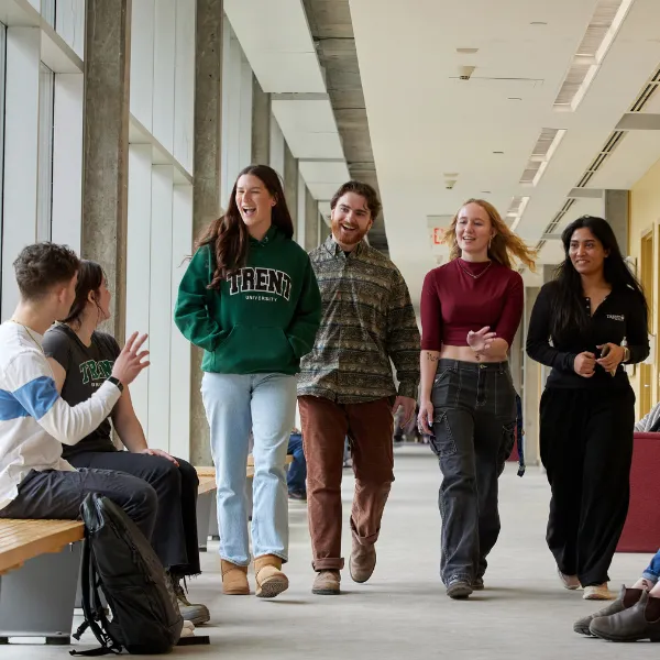 Students walking down hallway