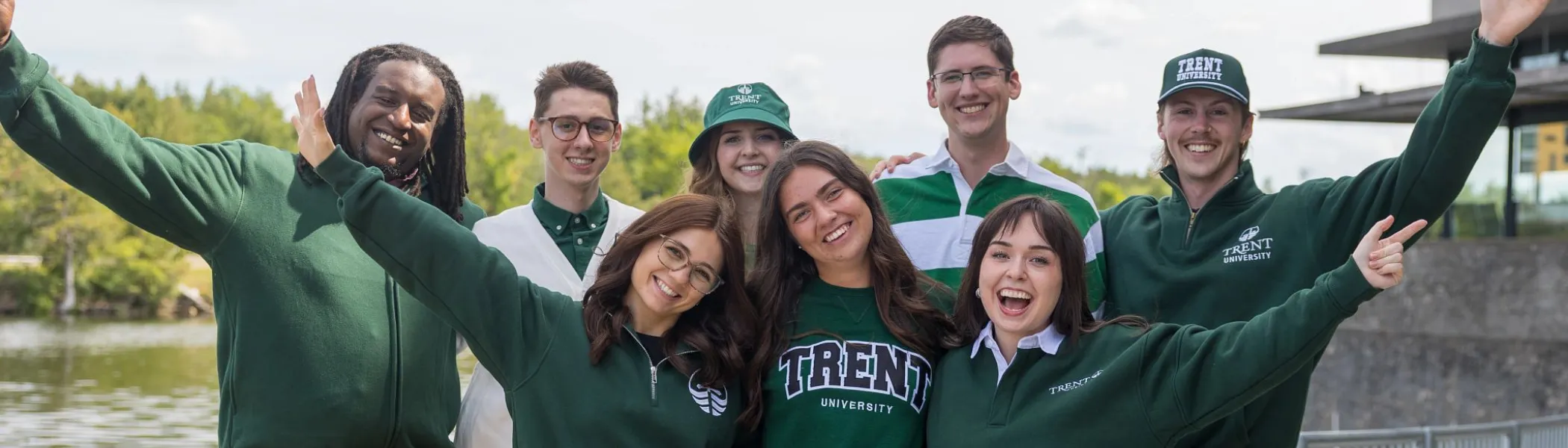 Enrollment advisors smiling at camera