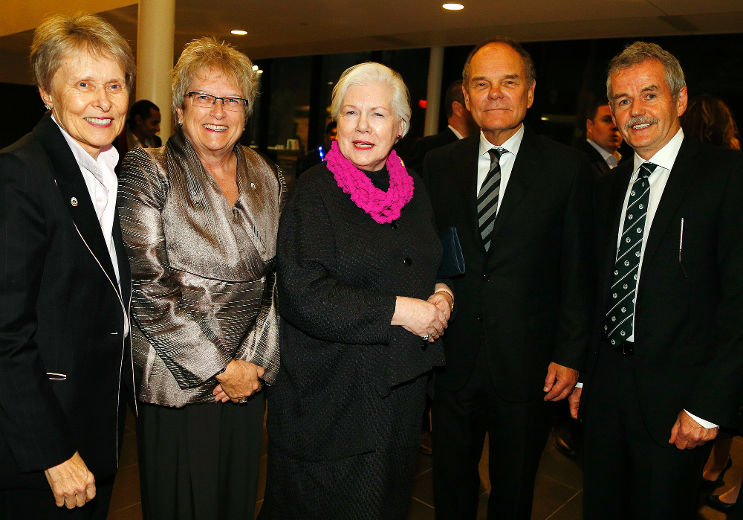 Don Tapscott poses with colleagues at the Chancellor gala. 