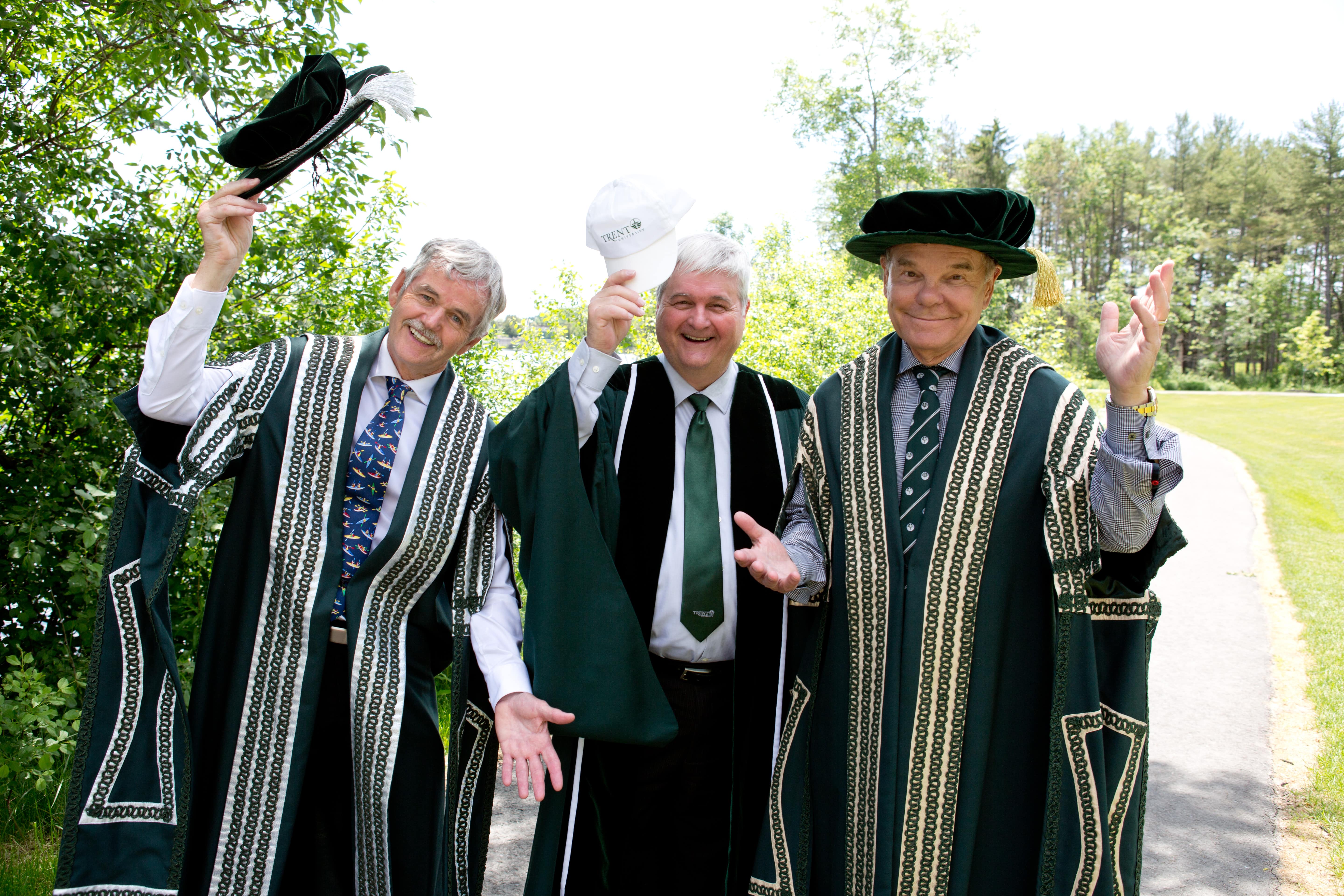 Don Tapscott poses for a photo with President and Vice-Chancellor Leo Groarke and Steven Kylie