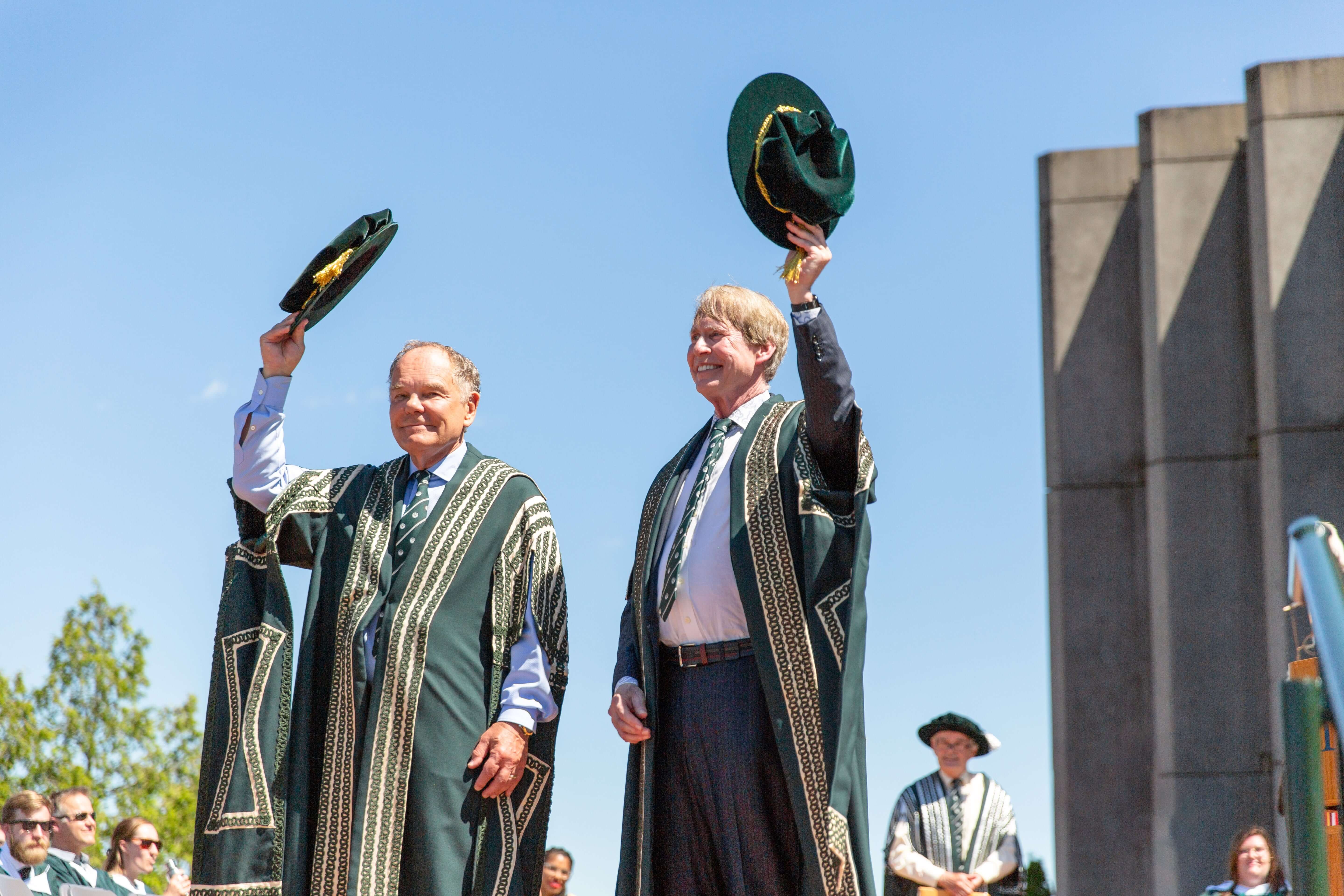 Chancellor Don Tapscott and Incoming Chancellor Stephen Stohn tip their hats at the 2019 convocation ceremonies at Trent University