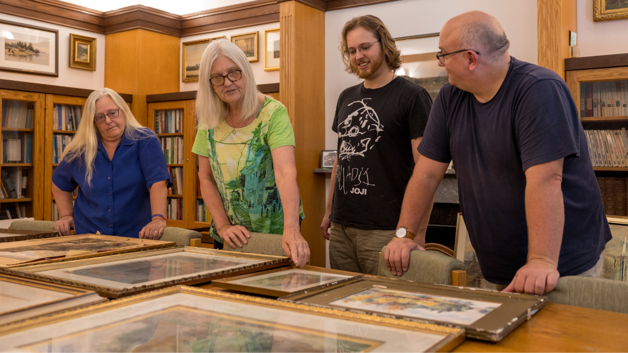 students in seminar with professors