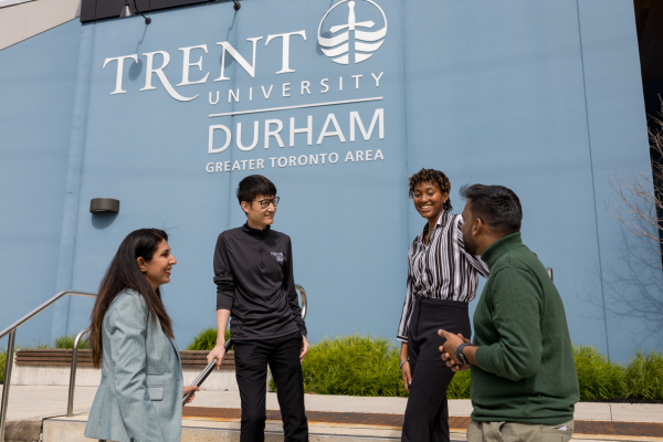 students outside on stairs 