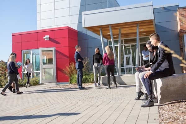 People outside of entrance