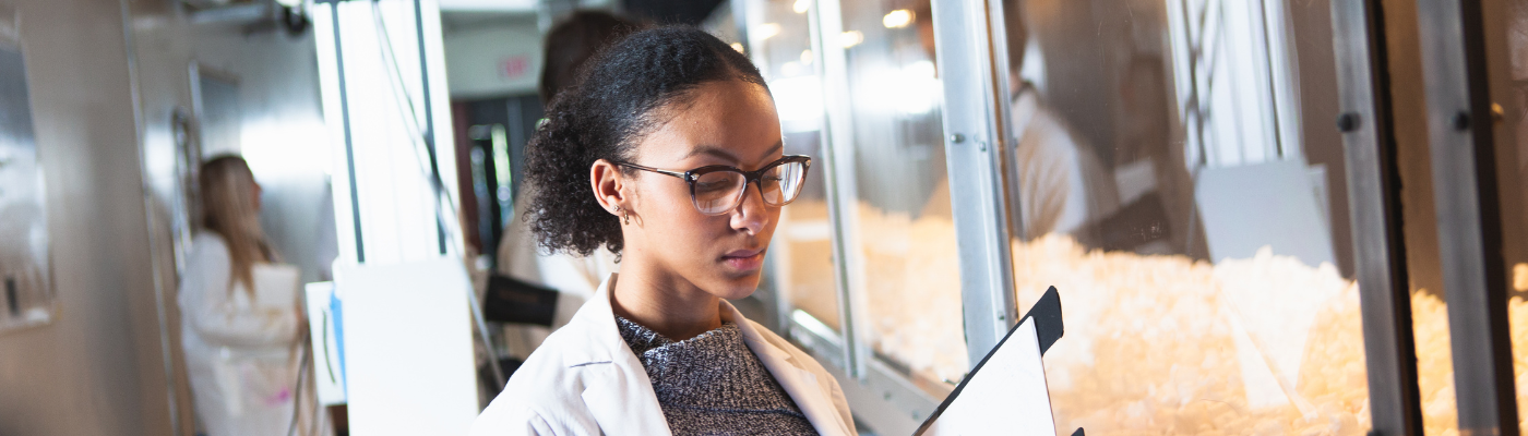 graduate student learning in lab