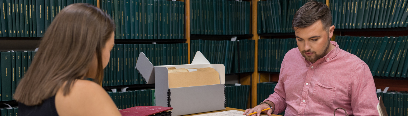 students studying in archives