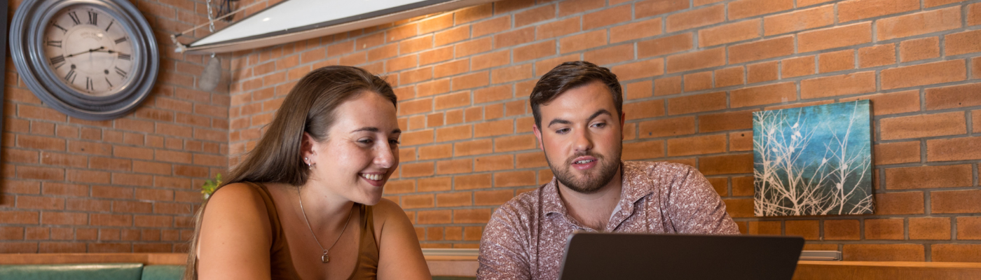 student looking at laptop