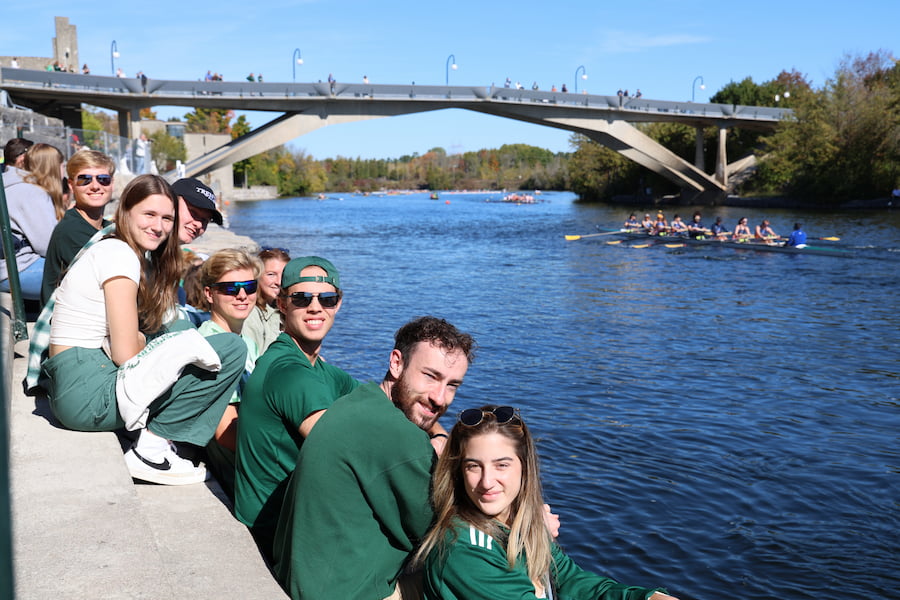Photos of students watching rowing