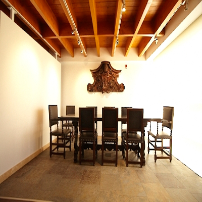 Interior of Bagnani hall  showing an orginal table and chair set