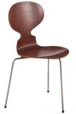 Brown wooden  chair with curved inwards back and three metal legs