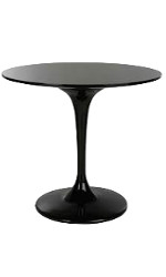 Black one piece table with both circular base and top, a high narrow leg