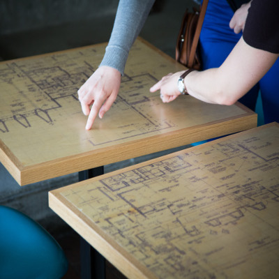 Two table tops with two building plans for Trent on display