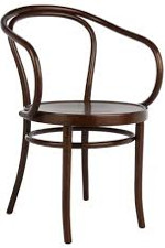 brown metallic chair with curved pieces forming the legs and the back and a circular base and seat
