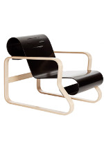 The paimio chair with wooden frame and black curving seat