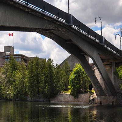 Lower view of Faryon bridge with focus on the tree's and other plant life that exists below it