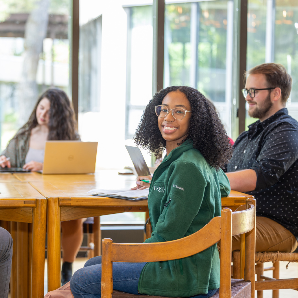 Student smiling at the camera