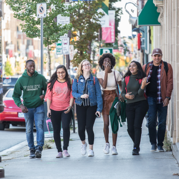 People walking on the sidewalk