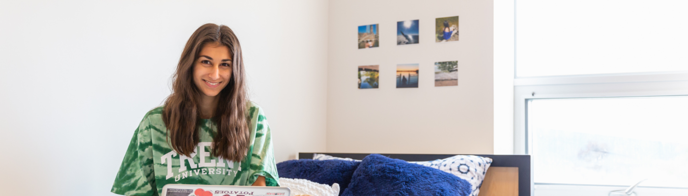 A student in their residence room.