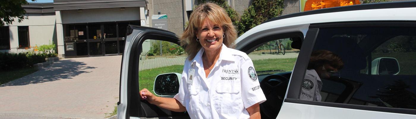 Campus Security guard smiling at the camera